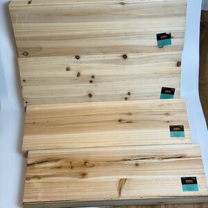 Natural Wood Woodpile" brand lumber boards. Planks